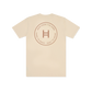 Ecru t-shirt with a circular logo and text on a white background 