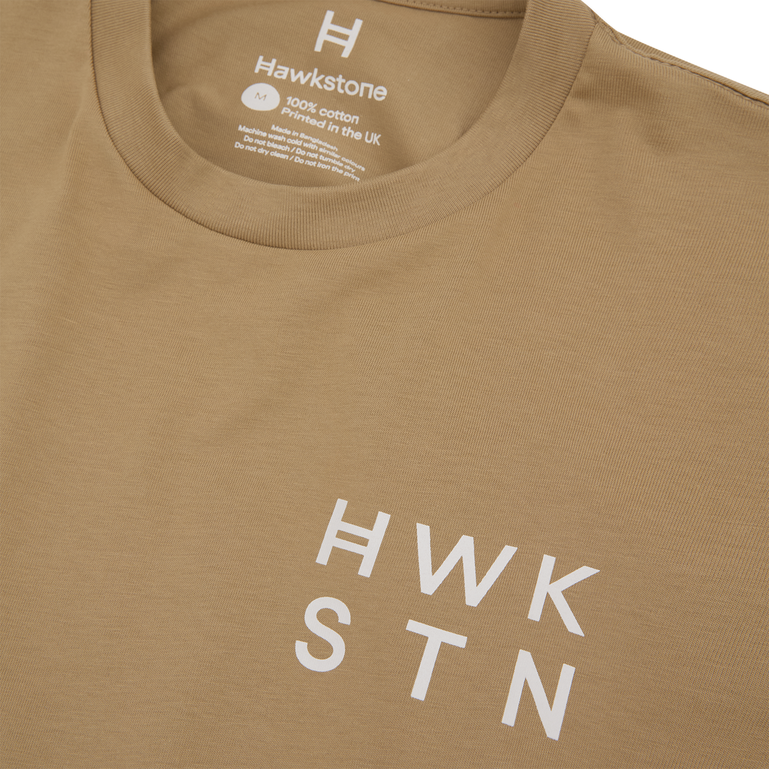 Khakhi t-shirt with 'Hawkstone' branding and 'HWK STN' text on a white background