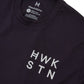 Ink blue t-shirt with 'HWK STN' text and Hawstone branding on a white background 