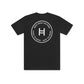 Black t-shirt with white circular logo and text on a white background 