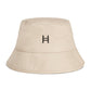 Beige bucket hat with a logo on a white background 